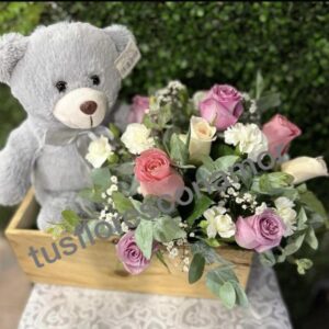 Tierno oso con rosas.